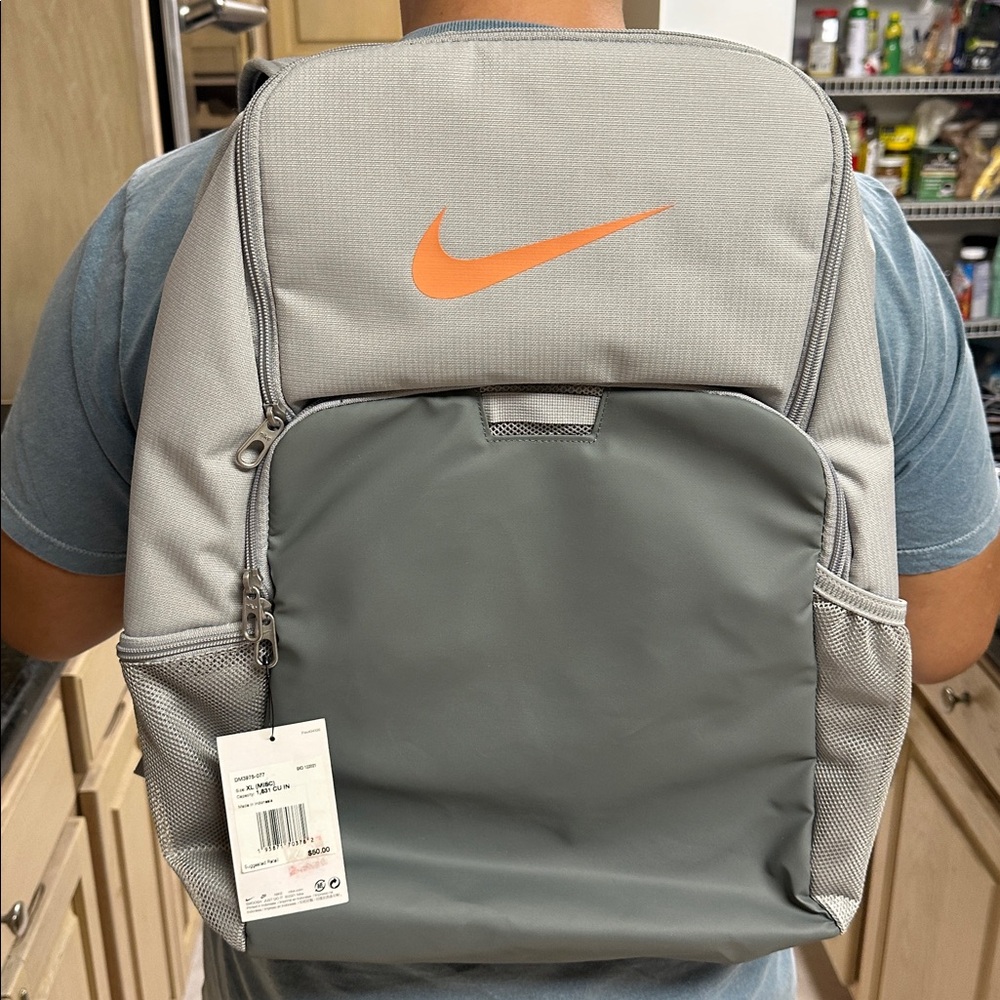 Nike Light Gray Backpack with Orange Logo